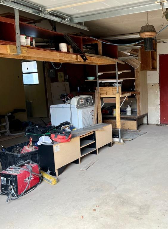 10208 Thomaswood Ln, Austin, TX 78736 - garage featuring washer and dryer