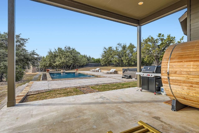 21808 Esmeralda Dr, Spicewood, TX 78669 - view of patio featuring area for grilling and an outdoor pool