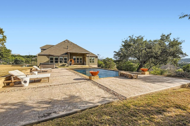 21808 Esmeralda Dr, Spicewood, TX 78669 - swimming pool featuring a patio area and a jacuzzi