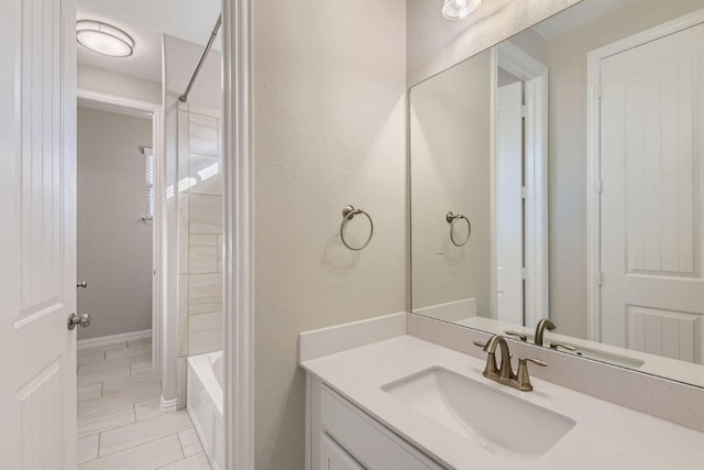 21808 Esmeralda Dr, Spicewood, TX 78669 - bathroom with vanity and bathing tub / shower combination