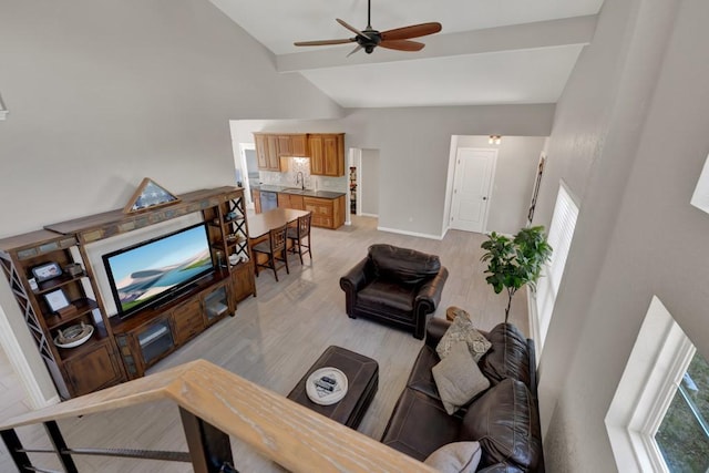 3055 Lakeview Dr, Canyon Lake, TX 78133 - living area with lofted ceiling, a ceiling fan, light wood-type flooring, and baseboards