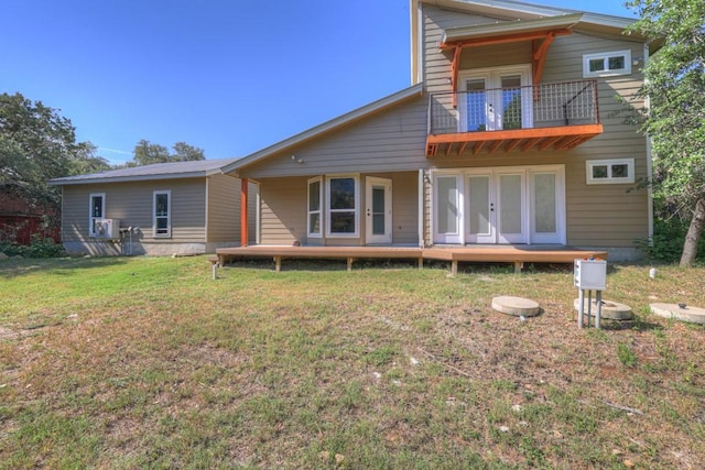 3055 Lakeview Dr, Canyon Lake, TX 78133 - back of property featuring a balcony, a yard, and french doors