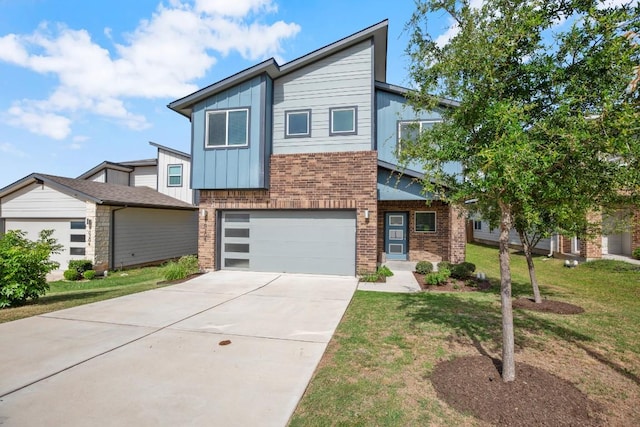 10208 Criswell Rd, Austin, TX 78754 - contemporary house featuring brick siding, board and batten siding, an attached garage, concrete driveway, and a front yard