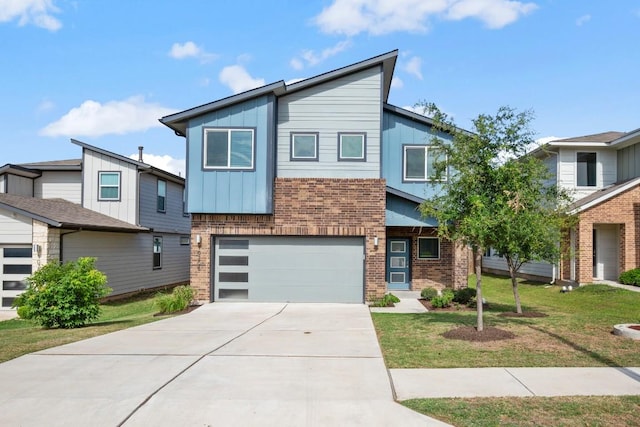 10208 Criswell Rd, Austin, TX 78754 - modern home with brick siding, a garage, driveway, and board and batten siding