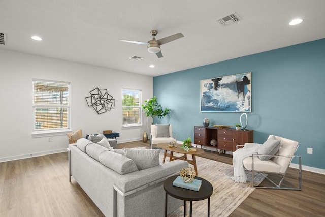 10208 Criswell Rd, Austin, TX 78754 - living area featuring ceiling fan, wood finished floors, baseboards, and recessed lighting