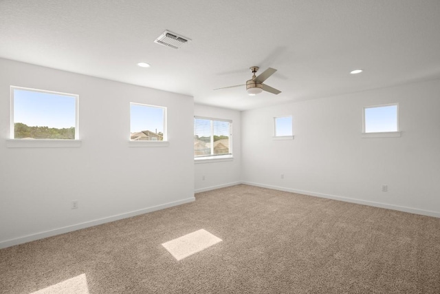 10208 Criswell Rd, Austin, TX 78754 - unfurnished room featuring light carpet, baseboards, ceiling fan, and recessed lighting