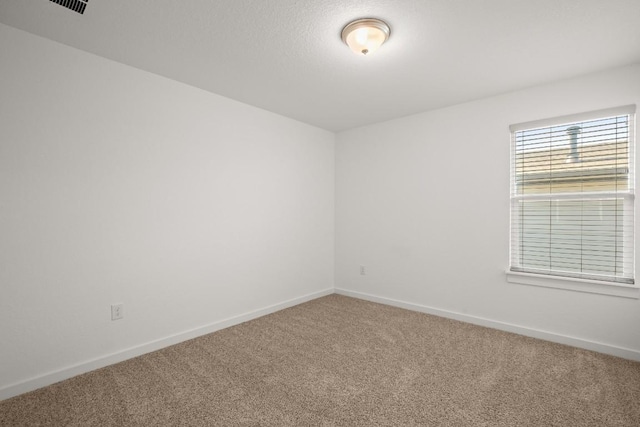 10208 Criswell Rd, Austin, TX 78754 - carpeted spare room with baseboards