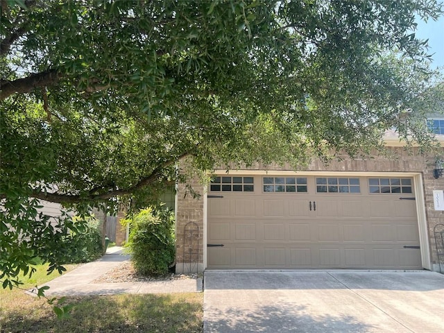 10016 Wading Pool Path, Austin, TX 78748 - garage featuring driveway