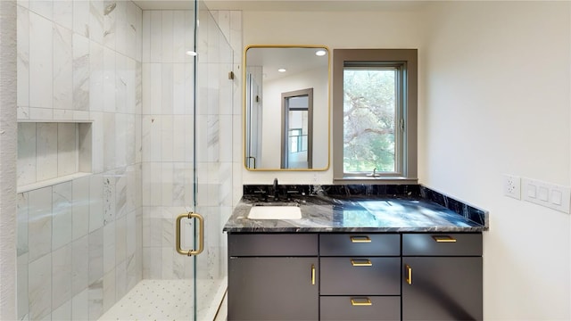 2700 Marina Shores Dr, Spicewood, TX 78669 - full bathroom with a shower stall, vanity, and recessed lighting