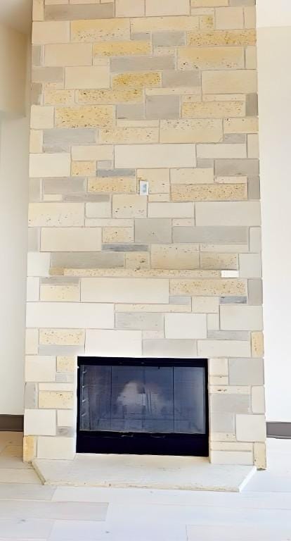 2700 Marina Shores Dr, Spicewood, TX 78669 - detailed view of a large fireplace and baseboards