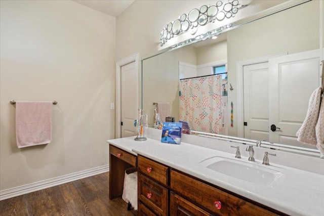 535 Creekside Dr, Salado, TX 76571 - bathroom with vanity, baseboards, wood finished floors, and a shower with curtain