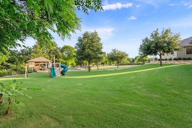 535 Creekside Dr, Salado, TX 76571 - view of home's community with a lawn