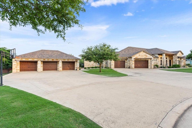 535 Creekside Dr, Salado, TX 76571 - view of front of property with stone siding, concrete driveway, and a front yard