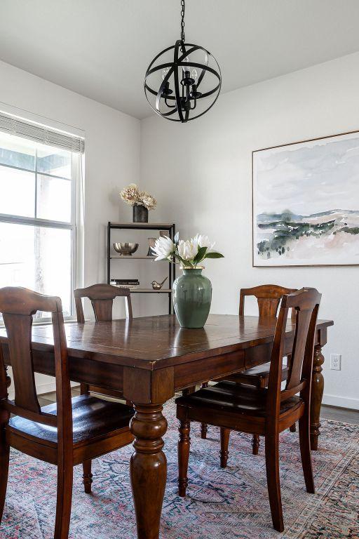 148 Feather Way, Fredericksburg, TX 78624 - dining room with a chandelier