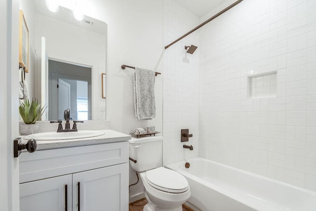 148 Feather Way, Fredericksburg, TX 78624 - bathroom with toilet, vanity, and shower / washtub combination