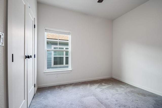 148 Feather Way, Fredericksburg, TX 78624 - unfurnished bedroom featuring carpet flooring, baseboards, and ceiling fan