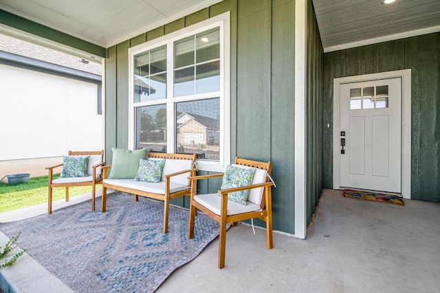148 Feather Way, Fredericksburg, TX 78624 - entrance to property featuring a porch and board and batten siding