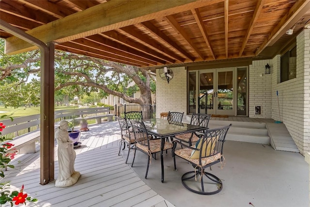408 Sombrero, Horseshoe Bay, TX 78657 - wooden deck featuring outdoor dining space and french doors