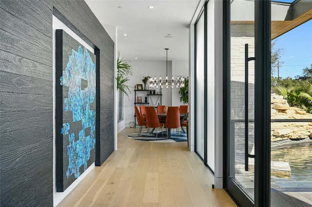 8209 Two Coves Dr, Austin, TX 78730 - entryway with wood finished floors, a chandelier, and recessed lighting