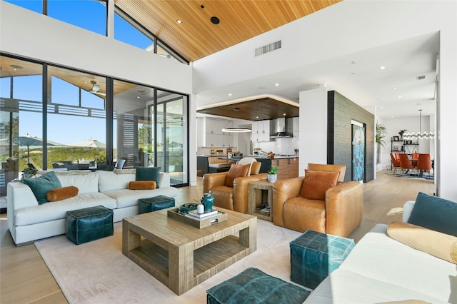 8209 Two Coves Dr, Austin, TX 78730 - living room featuring wood finished floors, high vaulted ceiling, recessed lighting, and wood ceiling