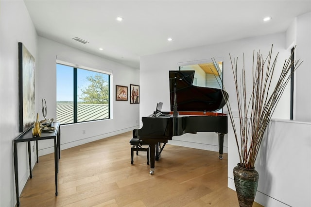 8209 Two Coves Dr, Austin, TX 78730 - sitting room with wood finished floors, recessed lighting, and baseboards