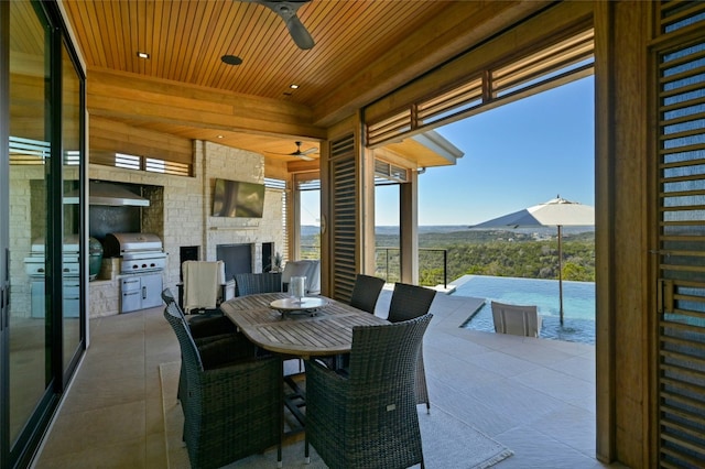 8209 Two Coves Dr, Austin, TX 78730 - view of patio featuring a ceiling fan and outdoor dining space