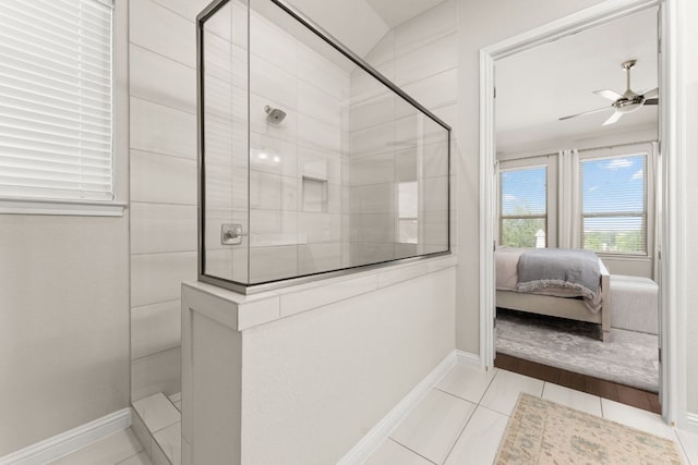7105 Jument Dr, Austin, TX 78738 - ensuite bathroom featuring a walk in shower, a ceiling fan, baseboards, and tile patterned flooring