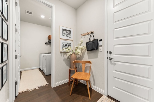 7105 Jument Dr, Austin, TX 78738 - laundry area featuring washer and dryer, wood finished floors, and baseboards