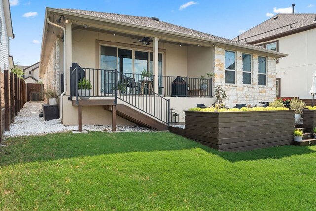 7105 Jument Dr, Austin, TX 78738 - rear view of property featuring stucco siding, stone siding, and a ceiling fan