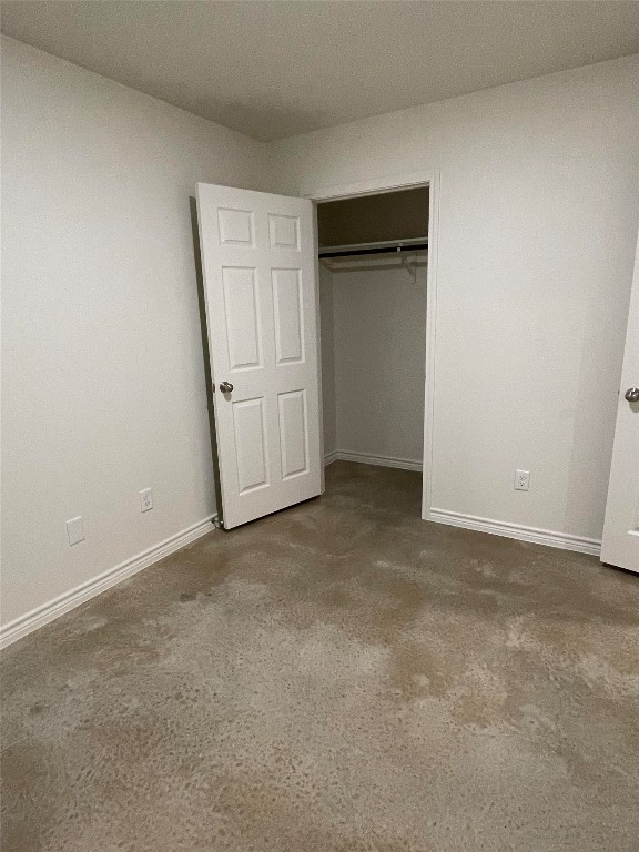 2313 Zanoletti Ct, Temple, TX 76504 - unfurnished bedroom with carpet flooring, a closet, and baseboards