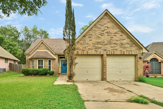 10603 Watchful Fox Dr, Austin, TX 78748 - view of front of house with an attached garage, concrete driveway, brick siding, cooling unit, and roof with shingles