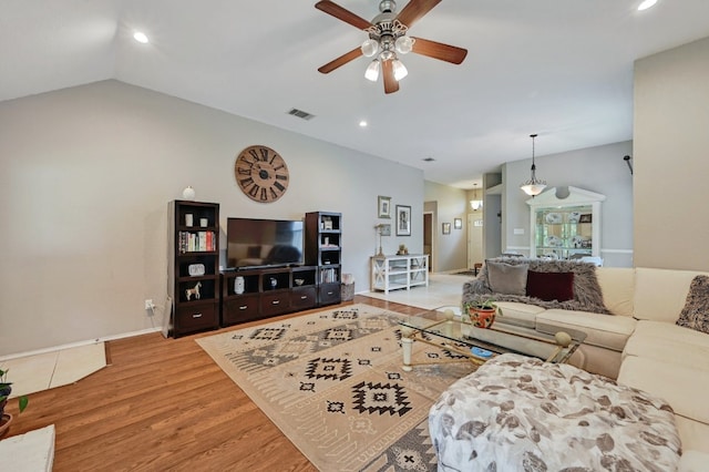 10603 Watchful Fox Dr, Austin, TX 78748 - living area featuring a ceiling fan, wood finished floors, recessed lighting, vaulted ceiling, and baseboards
