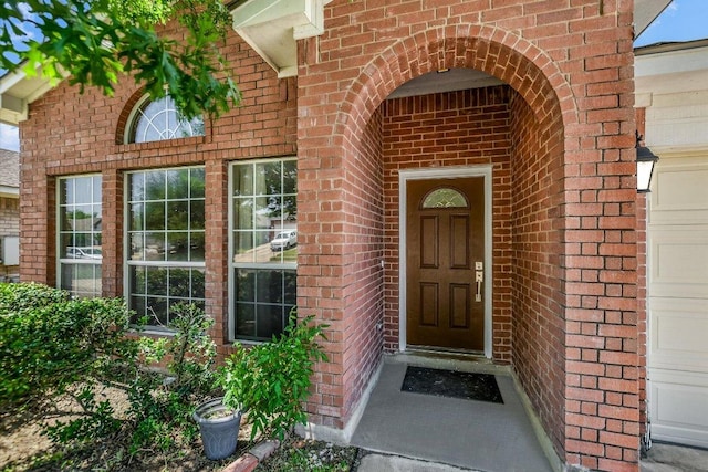 102 Cavalry Trl, Elgin, TX 78621 - doorway to property with brick siding