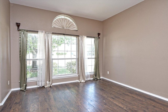 102 Cavalry Trl, Elgin, TX 78621 - empty room with dark wood-style flooring and baseboards