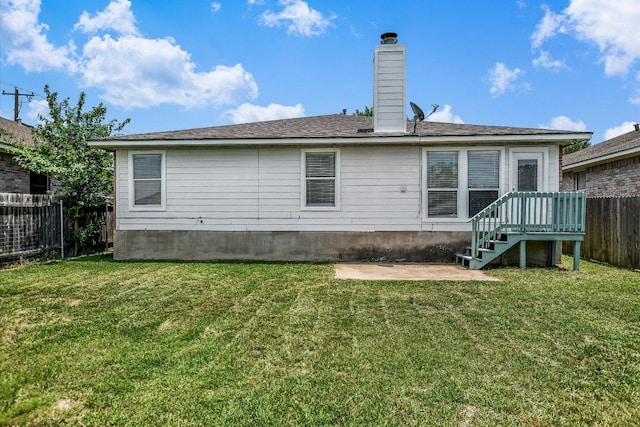 102 Cavalry Trl, Elgin, TX 78621 - rear view of house featuring a chimney and a patio