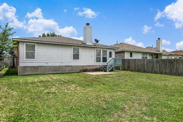 102 Cavalry Trl, Elgin, TX 78621 - rear view of property featuring a patio area and a chimney