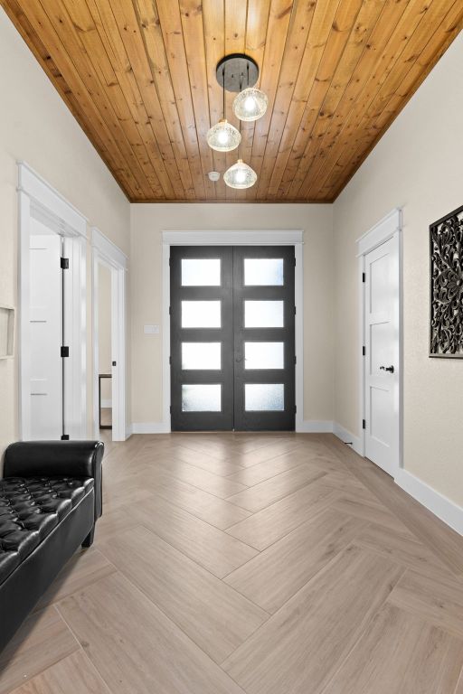 4374 Tall Rdg, Kempner, TX 76539 - foyer entrance with french doors, baseboards, and wooden ceiling