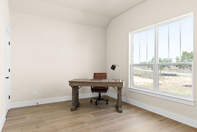 4374 Tall Rdg, Kempner, TX 76539 - home office featuring lofted ceiling, light wood-style flooring, and baseboards
