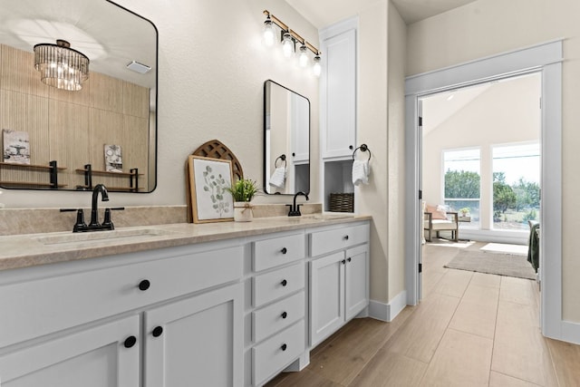 4374 Tall Rdg, Kempner, TX 76539 - bathroom with double vanity and baseboards