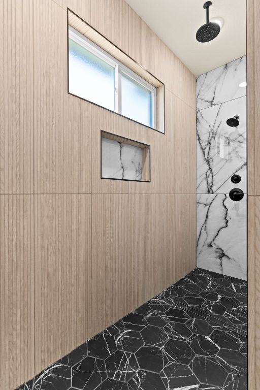 4374 Tall Rdg, Kempner, TX 76539 - bathroom featuring a marble finish shower and marble finish flooring