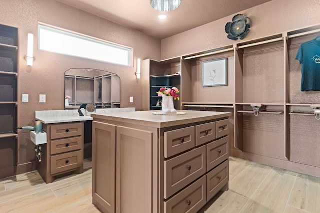 4374 Tall Rdg, Kempner, TX 76539 - walk in closet featuring light wood-style flooring