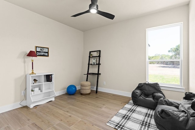 4374 Tall Rdg, Kempner, TX 76539 - sitting room with light wood-style floors, baseboards, and a ceiling fan