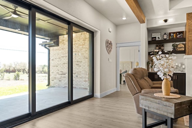4374 Tall Rdg, Kempner, TX 76539 - living area with light wood-type flooring, beam ceiling, and baseboards