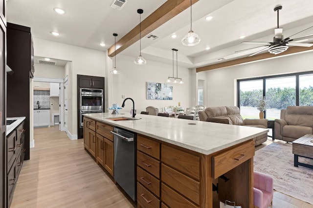 4374 Tall Rdg, Kempner, TX 76539 - kitchen with open floor plan, stainless steel appliances, a sink, ceiling fan, and plenty of natural light