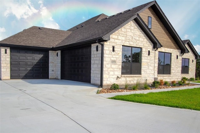 4374 Tall Rdg, Kempner, TX 76539 - view of side of property with stone siding, an attached garage, roof with shingles, and driveway