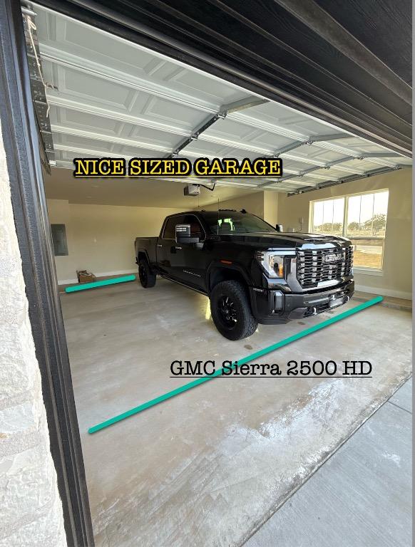 4374 Tall Rdg, Kempner, TX 76539 - garage with a garage door opener