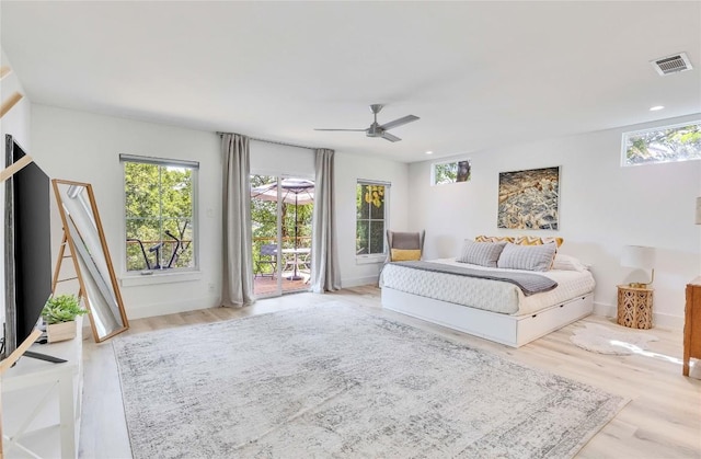 2419 Trail Of The Madrones, Austin, TX 78746 - bedroom with wood finished floors, access to outside, ceiling fan, and recessed lighting