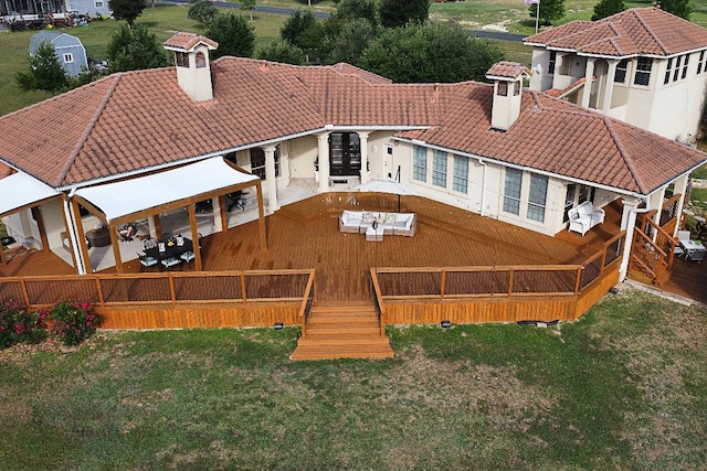17308 Saint Therese Rd, Manor, TX 78653 - back of house with a chimney, a tiled roof, french doors, and a yard