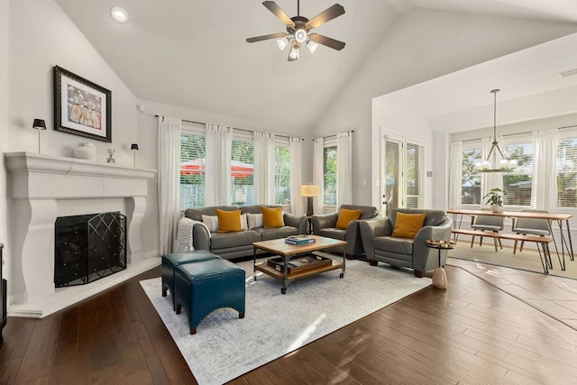 114 Fred Couples Dr, Round Rock, TX 78664 - living room featuring a ceiling fan, healthy amount of natural light, dark wood-style floors, high vaulted ceiling, and recessed lighting