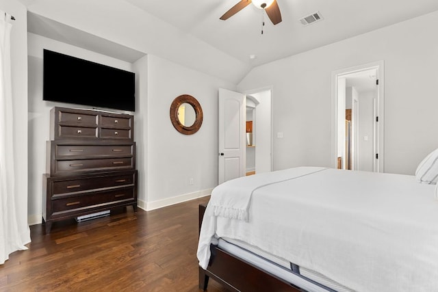 114 Fred Couples Dr, Round Rock, TX 78664 - bedroom with dark wood-style flooring, vaulted ceiling, baseboards, and a ceiling fan